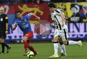Impressionnant d'activité à la récupération, Nicolas Seube, qui pourchasse, ici, Yoann Gourcuff, a été l'un des grands artisans de la victoire caennaise aux dépens de Rennes.