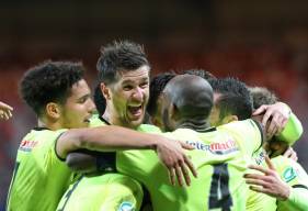 La joie des joueurs du Stade Malherbe après l'ouverture du score de Jessy Deminguet