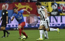 Impressionnant d'activité à la récupération, Nicolas Seube, qui pourchasse, ici, Yoann Gourcuff, a été l'un des grands artisans de la victoire caennaise aux dépens de Rennes.